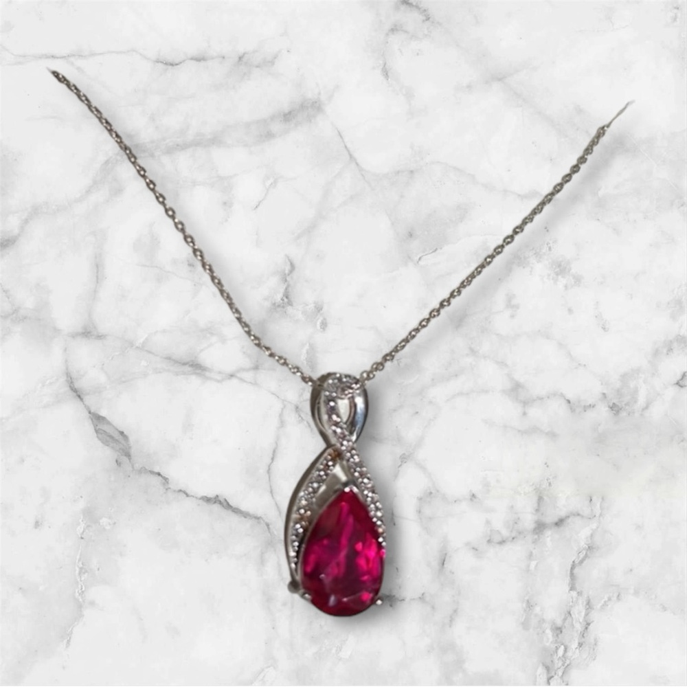 Garnet stone pendant and diamond necklace